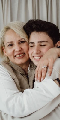 mother and son hugging 